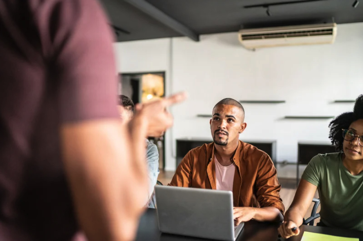 Adult students seated in a classroom at Ocean County College in Toms River, New Jersey, listening to an instructor during a workforce or adult education session.